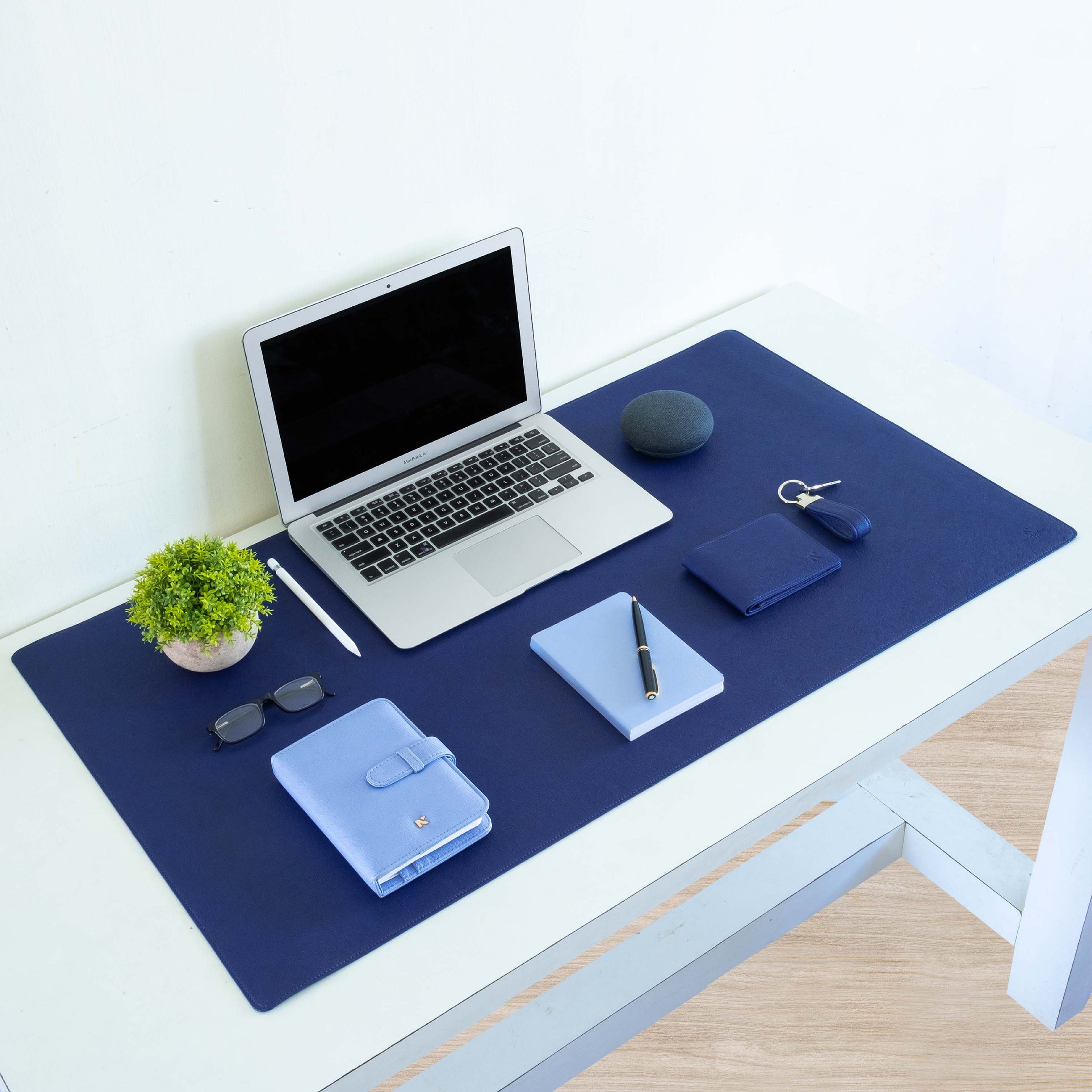 Neorah Desk Mat has a wide surface of (90cm x 45cm). Large enough to accommodate your office essentials Laptop, Mouse and Keyboard, Phone, Pen, Journal and other Stationery items.