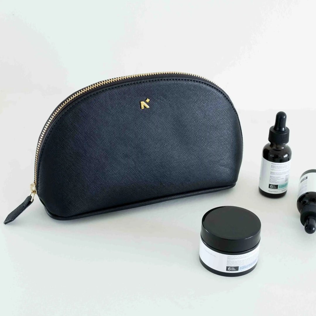 Neorah cosmetic pouch for travel, Best Makeup Bag, Designer makeup pouches to carry everyday makeup skincare and essentials for travel. #color_black