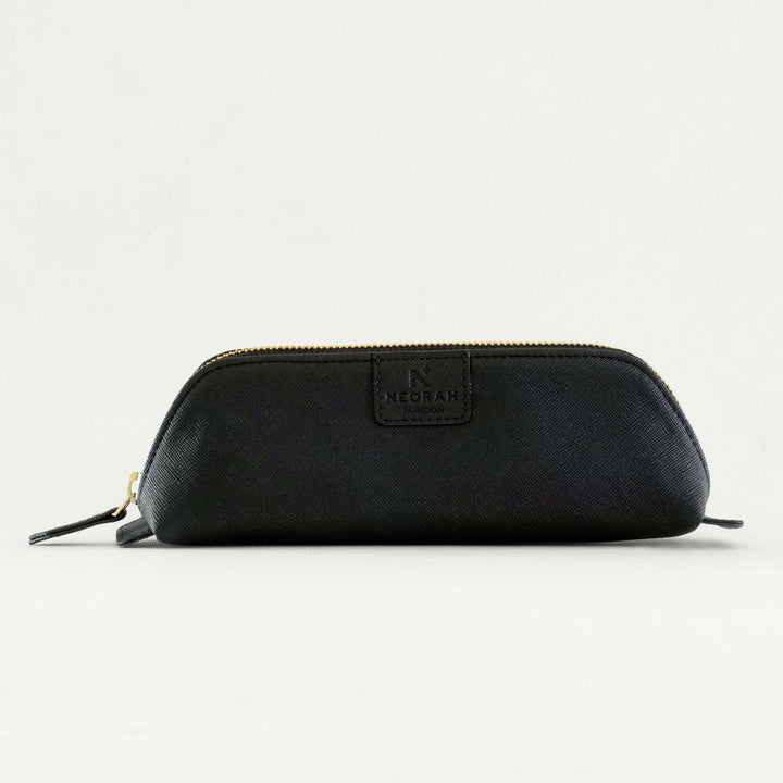 Made from European Vegan leather that's made to Last and handcrafted by experienced craftsmen Atelier NEORAH pencil pouch is a fashionable and modern way to store your pen/pencils.. Available in many beautiful colors.#color_black